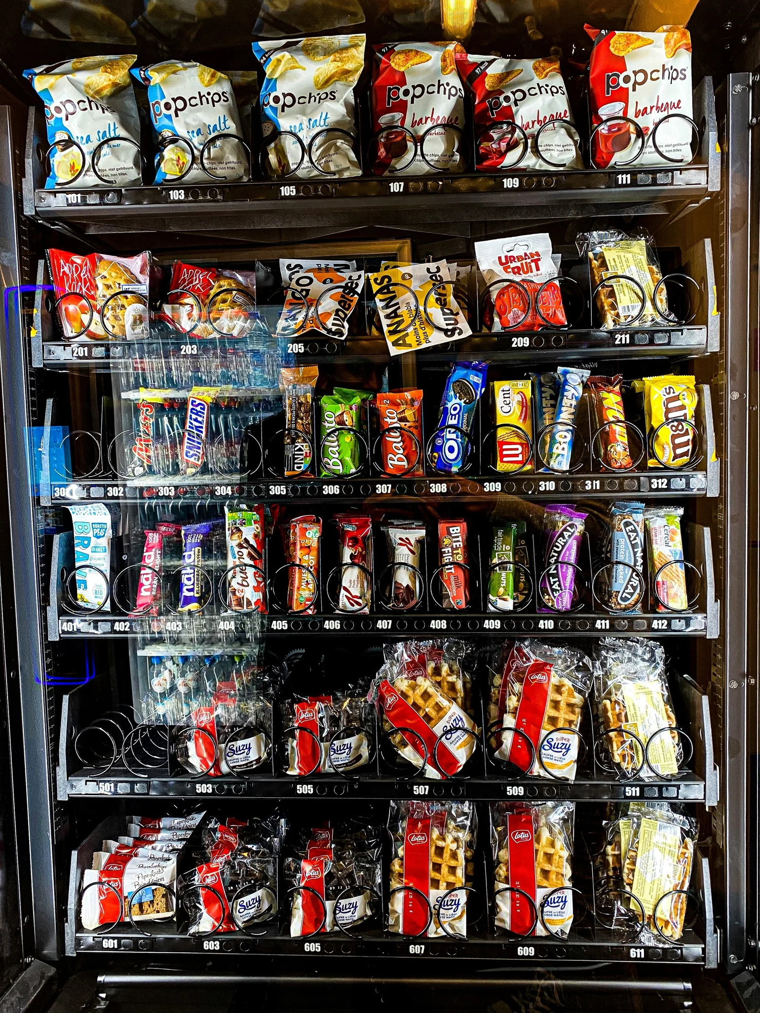 Best vending machine products UK showing a fully stocked Irelley combo machine with branded drinks snacks and confectionery
