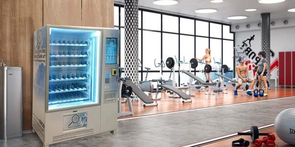 Vending machines for gyms with sports drinks and water in a UK gym reception