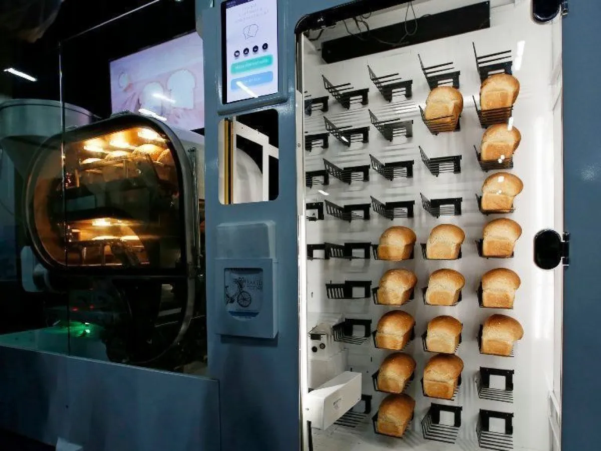 Bakery vending machine outside a UK independent bakery with fresh bread and pastries