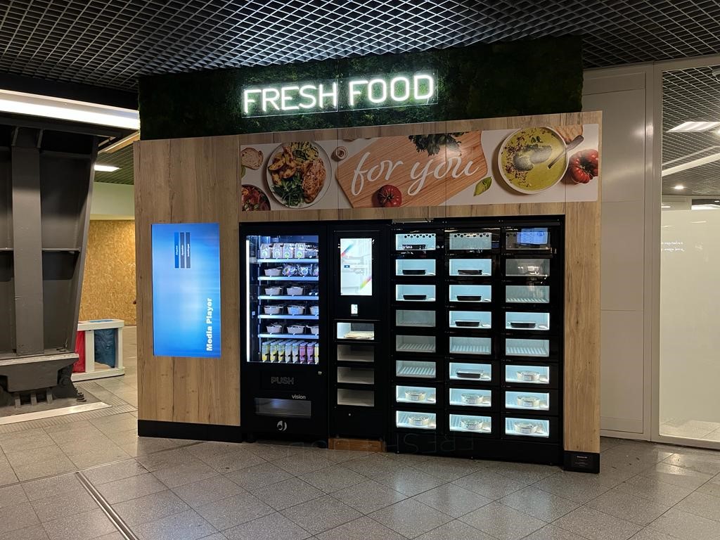Food vending machines selling snacks, sandwiches and drinks at a UK workplace
