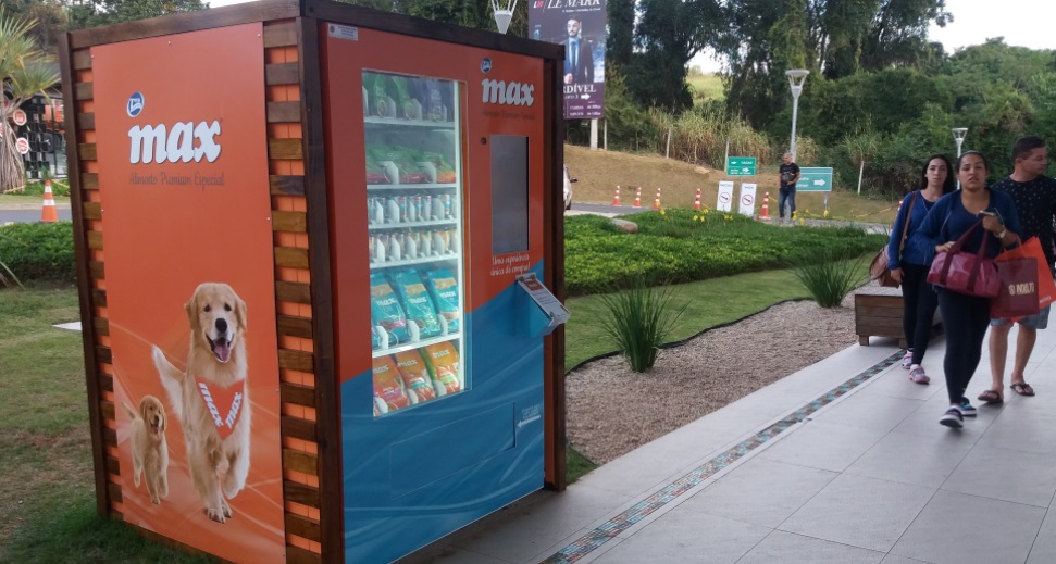 Pet vending machine selling dog treats and poo bags at a UK park